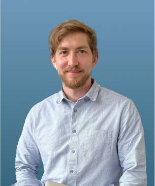 A image of a concrete sphere, balanced between two other larger spheres